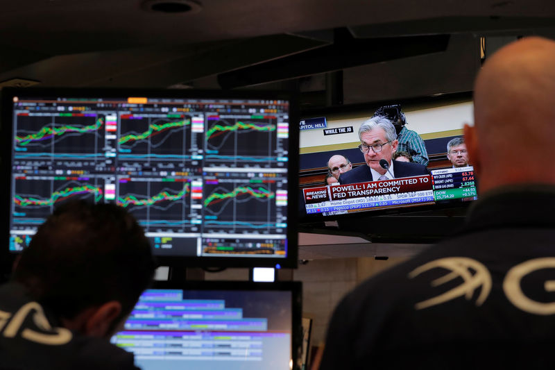As markets turn, Fed says it is not fazed