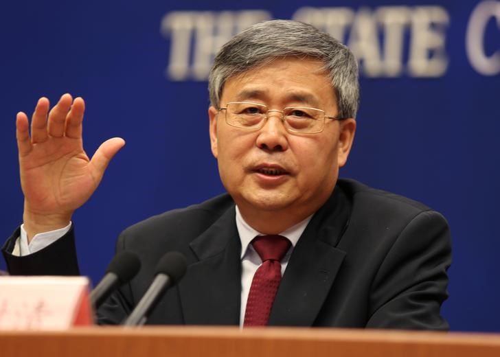 China regulator says debt defaults natural