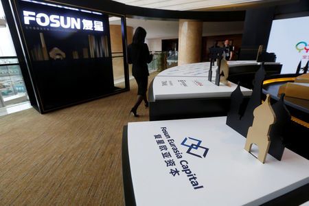 China's Fosun CEO and VP step down in surprise reshuffle