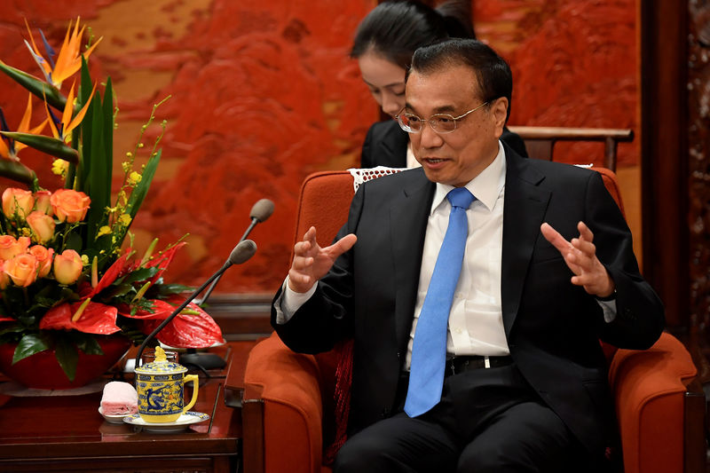 China's Premier Li says open to trade negotiations with United States