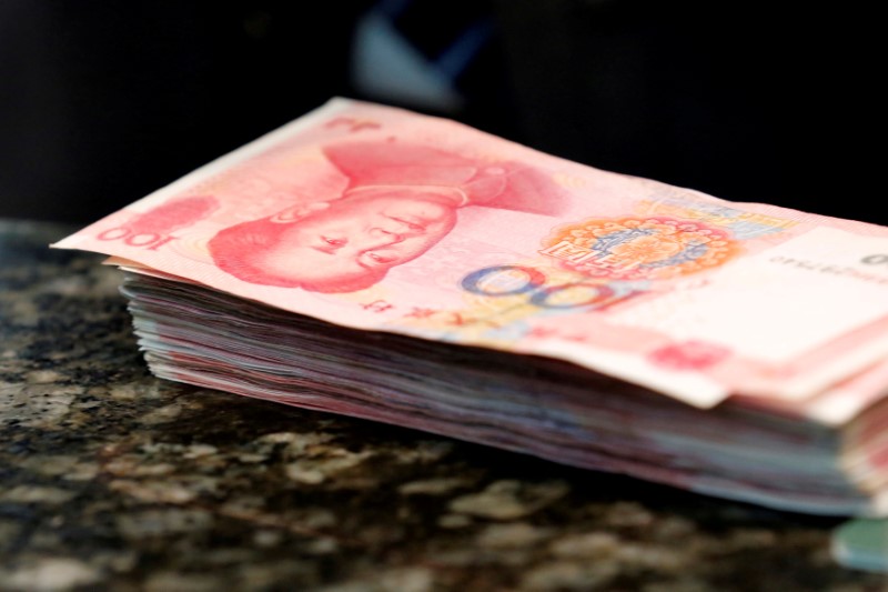 China's yuan at new lows as trade war threatens market instability