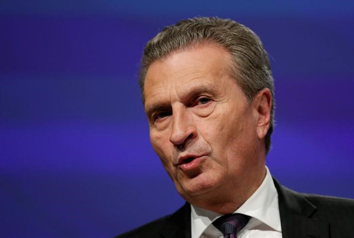 EU's Oettinger says 'grateful' for Italian economy minister's words