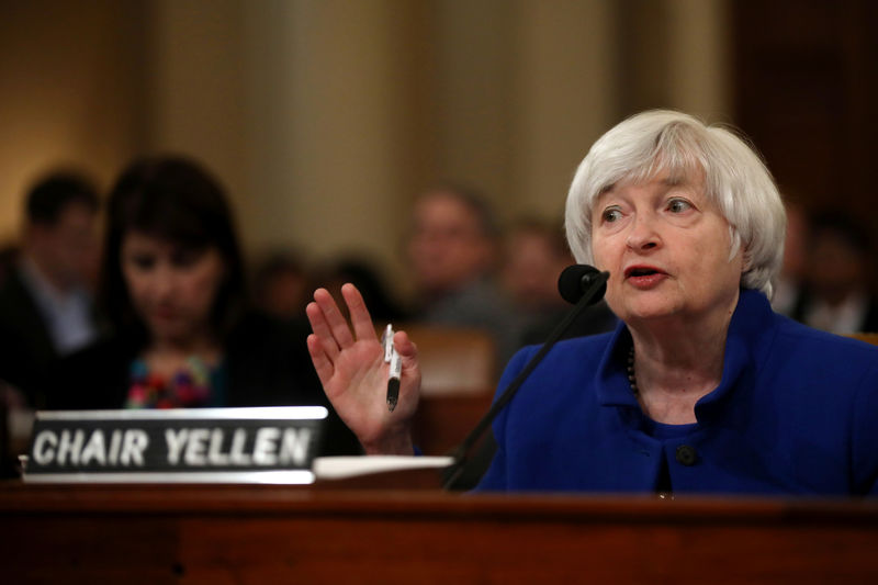 Fed raises interest rates, keeps policy outlook unchanged for 2018