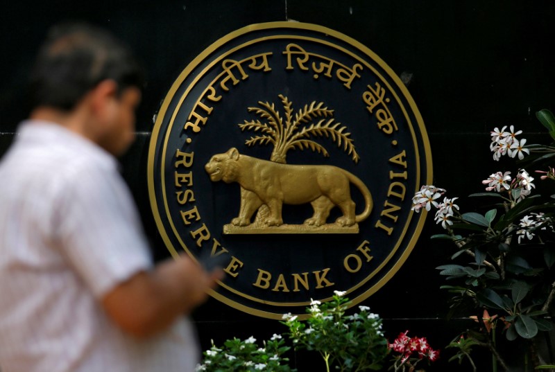 India's central bank, in a tight spot, is expected to raise rates again