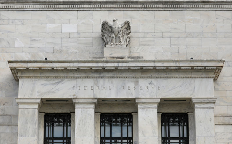 Interest rate futures traders see more Fed hikes next year