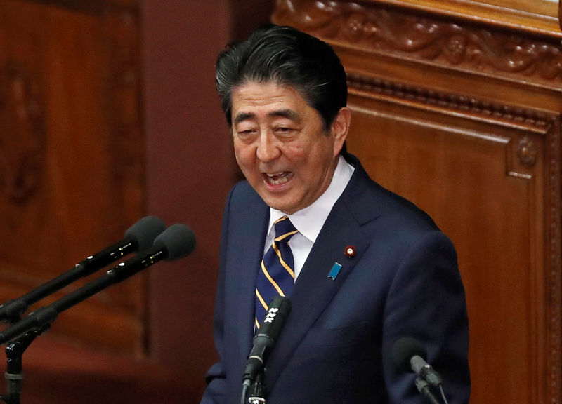 Japan PM Abe says BOJ's policy helped create more jobs
