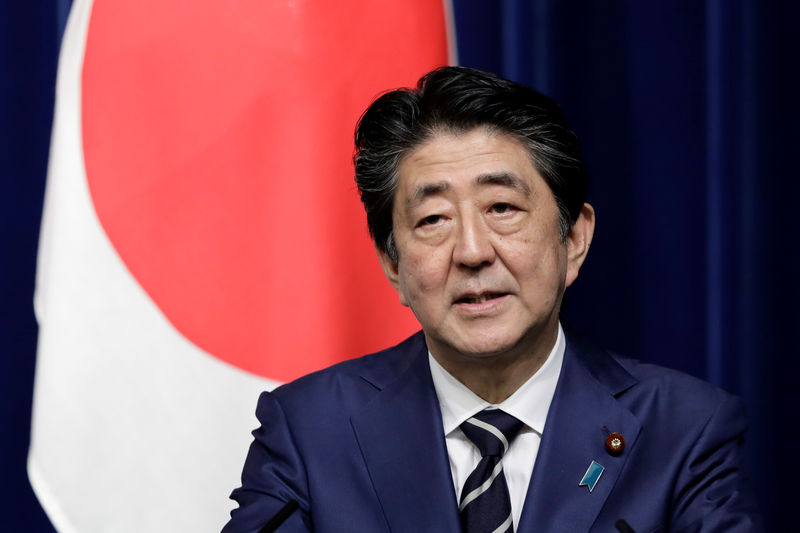 Japan's PM Abe says specific monetary policy steps up to BOJ to decide