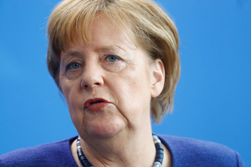 Merkel sounds upbeat on euro zone reform as coalition wrangles