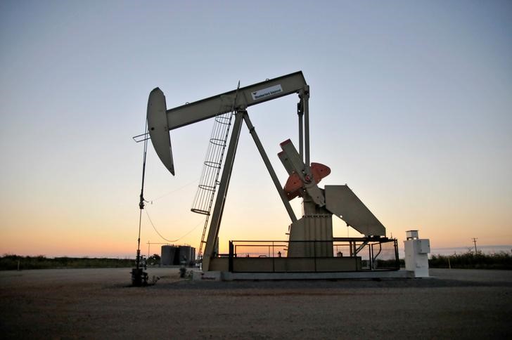 Oil prices edge up on report of lower U.S. crude inventories