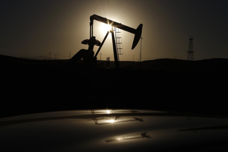 Oil prices extend gains, buoyed by unexpected drop in U.S. gasoline stocks