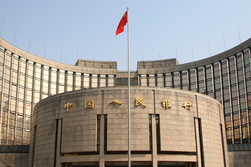 China Bonds Rally, Broker Shares Jump on Bets PBOC May Ease Soon