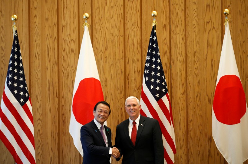 Pence told Japan's Aso he favors bilateral trade deal: sources