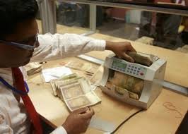 Sri Lanka rupee ends higher as state bank cuts dollar peg