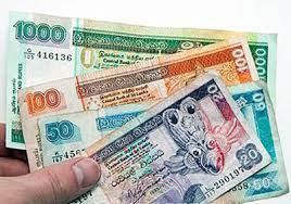 Sri Lankan rupee firmer on bank dollar sales
