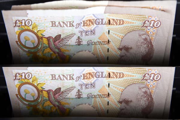 Sterling at one-month low vs dollar as BoE rate hike bets pushed back