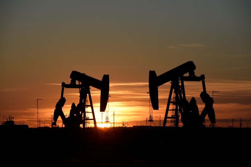 U.S. oil edges up after 3 percent drop on big stock build