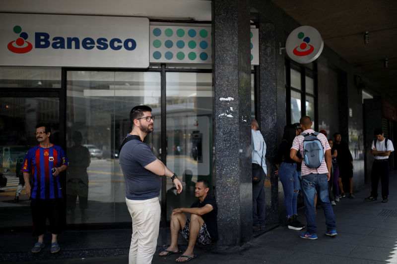 Venezuela suspends state intervention of top private bank Banesco