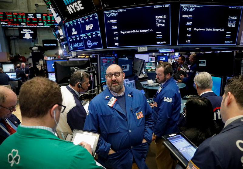Wall Street scales higher on tech gains; Fed's rate decision awaited