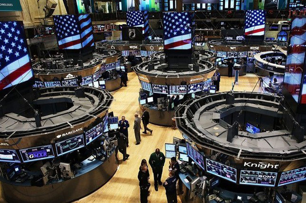 Wall Street slides, Dow erases 2018 gains as trade spat intensifies