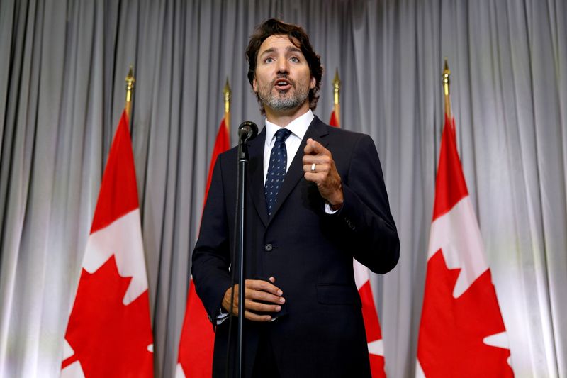 Trudeau roils Canada's oil patch naming Greenpeace activist as climate chief