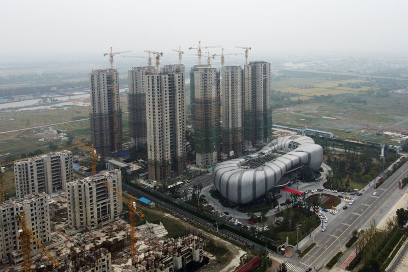 China's debt-ridden Evergrande resumes work on more than 10 property projects