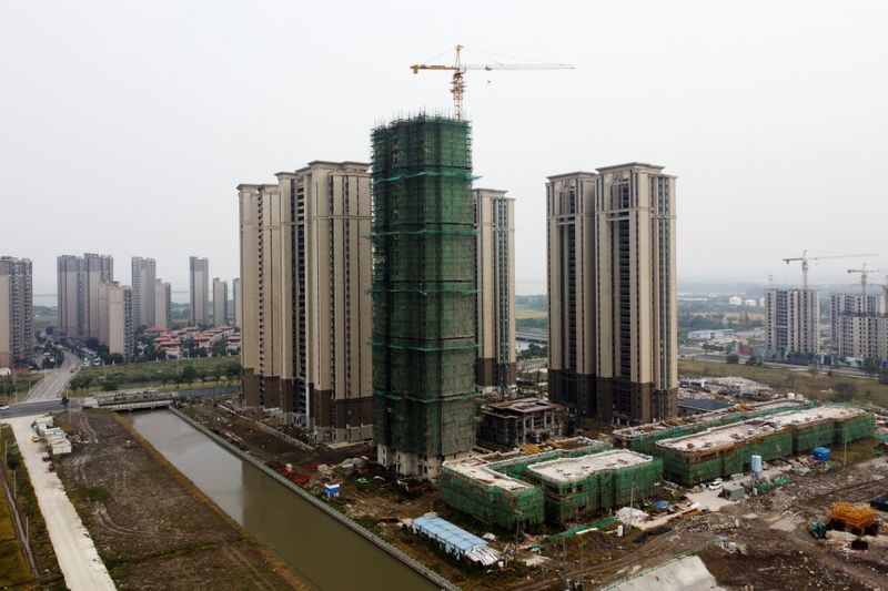 Factbox-China's indebted property market and the Evergrande crisis