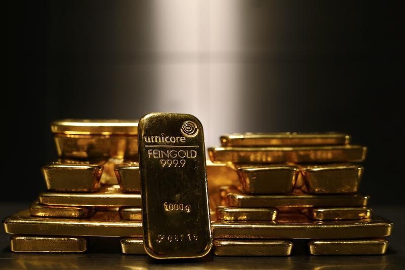 Gold prices pull back further from record highs; Fed cuts in focus