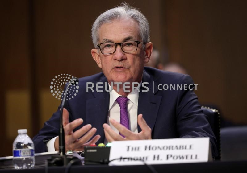 With Fed taper expected, investors brace for rate hikes on horizon