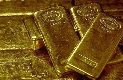 Gold dips as hawkish Fed lifts US dollar and yields