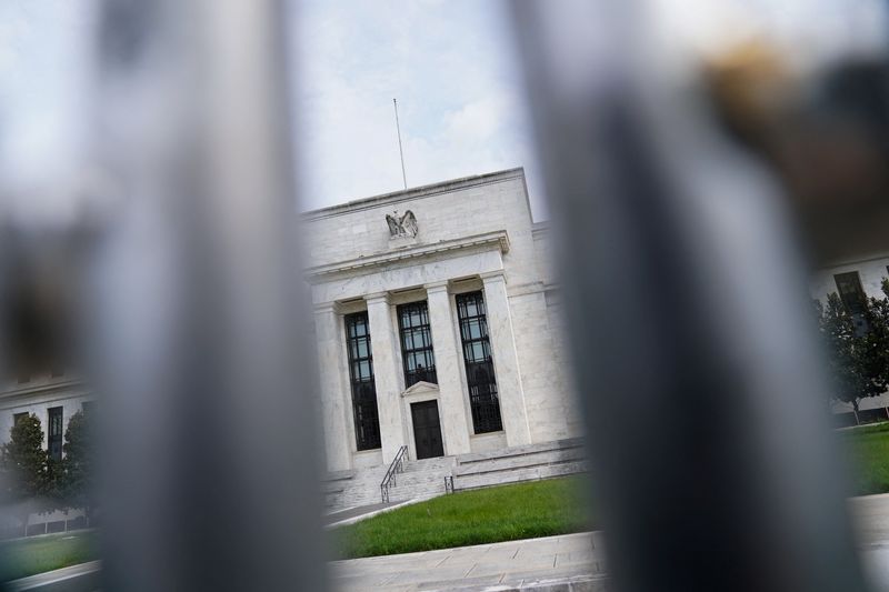 Fed officials jack up rates, inflation outlook