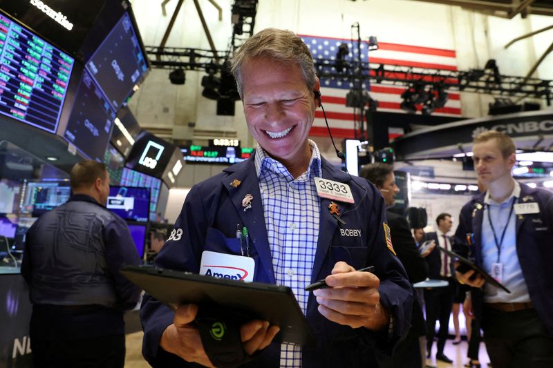 Wall St rallies as traders dial back rate-hike bets