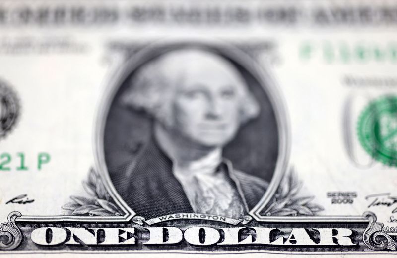 Dollar index falls as traders weigh Fed rate path