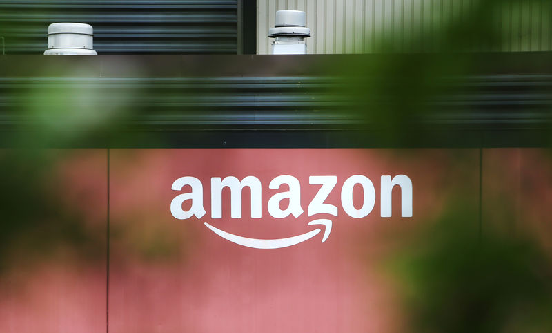 Amazon, T-Mobile rise premarket; Walgreens, Coinbase fall