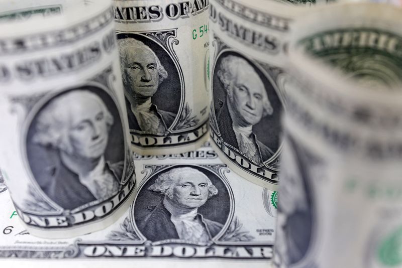 Dollar slides on expectations of less hawkish Fed, euro at 1-month high