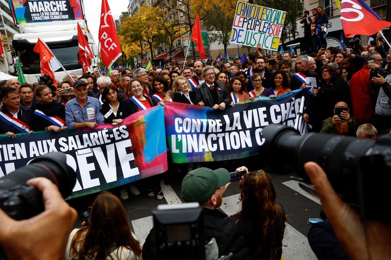 Thousands take to the streets of Paris to protest soaring prices