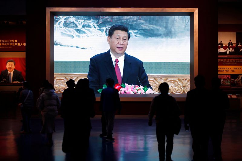 Xi touts COVID fight, China economic model in party congress speech