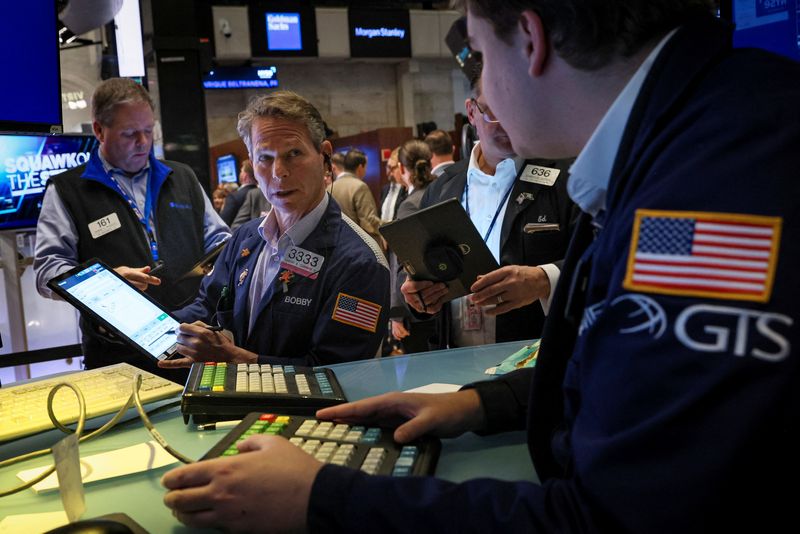 Dow opens higher on easing China COVID curbs; Tesla weighs on Nasdaq