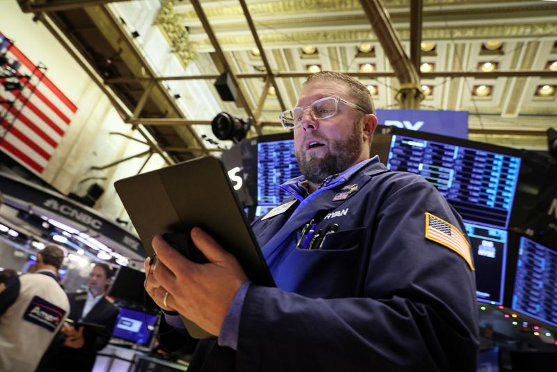 Wall St inches lower at open after selloff on Fed worries